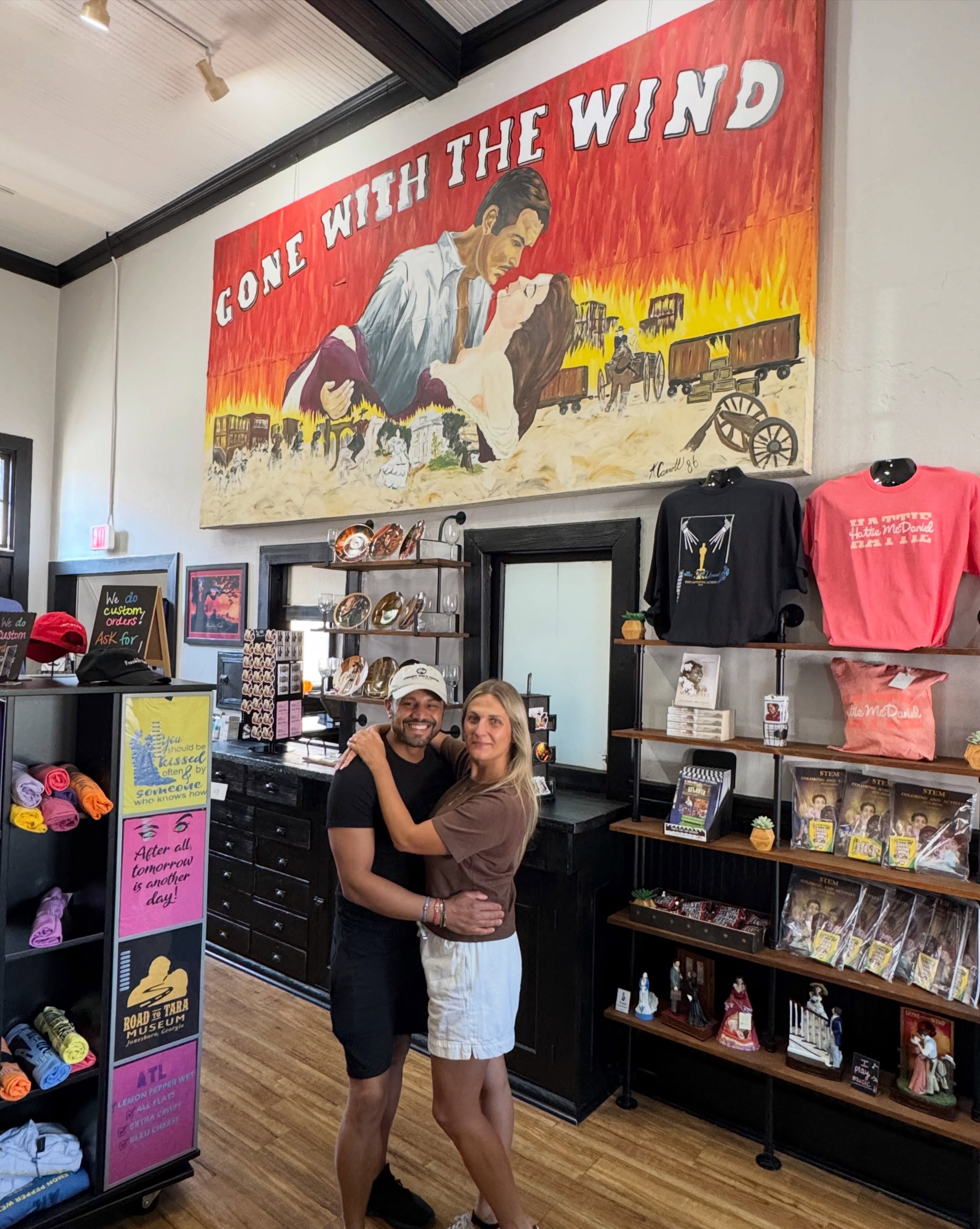 We recently received a comment asking why do visitors from around the world stop by the Clayton County Visitors Center and Road to Tara Museum? Here’s one reason!
Meet these lovely honeymooners from Italy! 🇮🇹
While enjoying a three-week road trip from Miami to New Orleans, the newlyweds made a special stop in Jonesboro, GA, all because of Elisa’s love for Gone With the Wind!
It’s a love she shares with her mother, whom she even FaceTimed during her visit to share the experience!
We love seeing how stories connect generations and bring travelers from across the world to Clayton County, GA.
Love Gone With the Wind or interested in learning more?
Celebrate the 90th anniversary of the film and novel with us in Jonesboro on Sunday, November 8, 2026!
Details at the link in our bio.
📍 Clayton County Visitors Center | Road to Tara Museum, 104 N. Main Street, Jonesboro, GA
Monday - Saturday
10 am to 4 pm
Clayton County, GA is Open to the World!
#SeeClaytonCountyGA #OpenToTheWorld #RoadToTaraMuseum #ExploreGeorgia #GeorgiaTourism