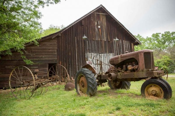 an old tractor and barn at Reynolds Nature Preserve