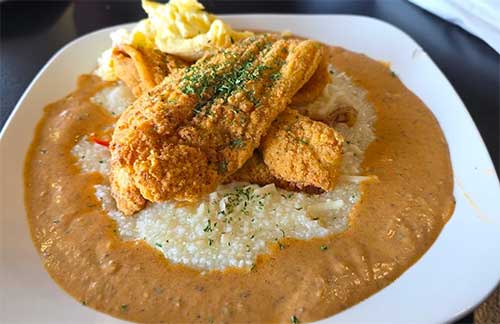 fried catfish over grits