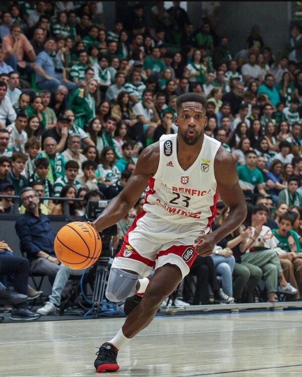guy dribbling basketball