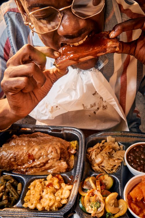 guy eating bbq rib